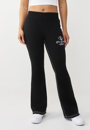 FLARE - Pantalon classique - black