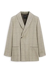 Lichtbeige blazer met een ruitenpatroon. Heeft een sjawlrapport, sluiting met een middelste knoop en twee voorkennis. Glad textielafwerking.