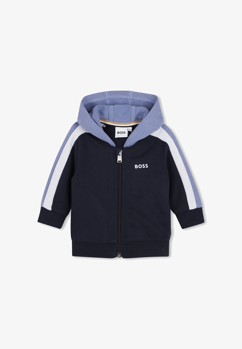 Sweat à capuche zippé bleu marine avec panneaux contrastants bleu clair aux épaules et aux manches. Il comporte une fermeture éclair à l'avant et un logo "BOSS" sur la poitrine.