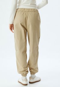 Koton JOGGER - Cargobyxor - beige