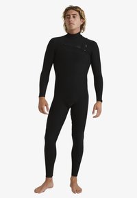 Black wetsuit with long sleeves and full legs, featuring a high neck and front zip pocket, made of smooth and stretchy material.