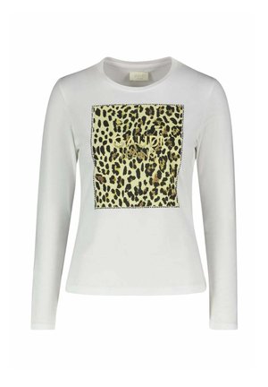 Camicia bianca a maniche lunghe con un motivo quadrato leopardato e la scritta "GAUDI JEANS" al centro davanti.
