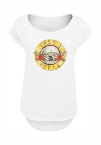 White t-shirt with a rounded neckline and short sleeves. Features a colorful Guns N' Roses logo with a skull, roses, and circular border.