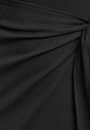 Black ribbed fabric with pleated detailing, featuring a soft texture and smooth finish. The material is stretchy and form-fitting.