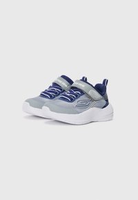 Children’s blue and gray Skechers sneakers with white soles, elastic laces, and a Velcro strap on a plain white background.
