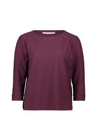Haut bourgogne à manches longues avec un motif texturé, col rond et ourlet légèrement courbé. Le matériau semble doux et extensible.