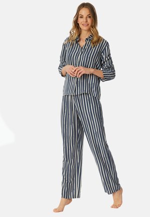 Navy- och vitrandig pyjamasuppsättning, som består av en knapp-up skjorta med uppvikta ärmar och matchande byxor med rak ben-design.