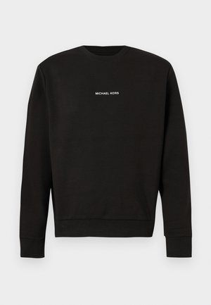 Sudadera negra hecha de tela suave, con cuello redondo, mangas largas y el logo blanco "MICHAEL KORS" centrado en el pecho.