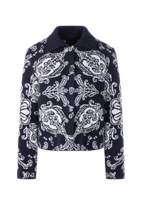Navy blue cropped jacket featuring a white floral pattern, button front, and collared neckline. Made from textured knit fabric.