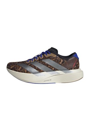 Running shoe with a brown leopard print upper, silver stripes, blue accents, and a white midsole labeled "LIGHTSTRIKE PRO." Lightweight design.
