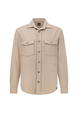 Beżowa koszula z długim rękawem uszyta z miękkiego materiału, z klasycznym kołnierzykiem, dwoma kieszeniami na piersi i zapięciem na guziki z przodu.