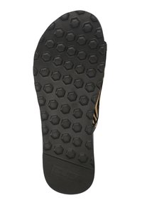 Suola di scarpa in gomma nera con un motivo a trama esagonale, caratterizzata da una sezione liscia sulla parte del tallone e un logo del marchio sul bordo inferiore.