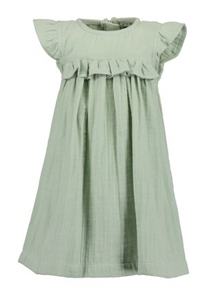 Abito di cotone verde chiaro con maniche a sbuffo, dettagli arricciati sul petto e una vestibilità morbida. Si chiude con un bottone sul retro.