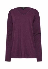 Långärmad V-ringad topp i mörklila, med avslappnad passform och mjukt, strukturerat tyg, med minimala sömnadsdetaljer längs fållen.