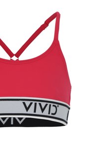 Vaaleanpunainen urheilBra, jossa on säädettävät ristiin menevät hihnat ja musta-valkoinen elastinen vyö, jossa on "VIVID"-logo. Sujuva rakenne, istuva malli.