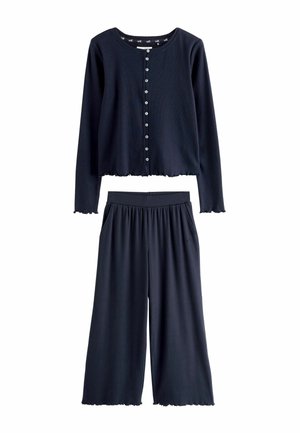 Navy loungewear set featuring a cropped top with buttons and wide-leg pants. Soft fabric with wave-edged hems and side pockets.