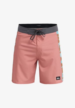 Herenzwembroek in koraalkleur met een grijze tailleband. Voorzien van een blauw-bruine patroon langs de zijkant en een trekkoordsluiting.