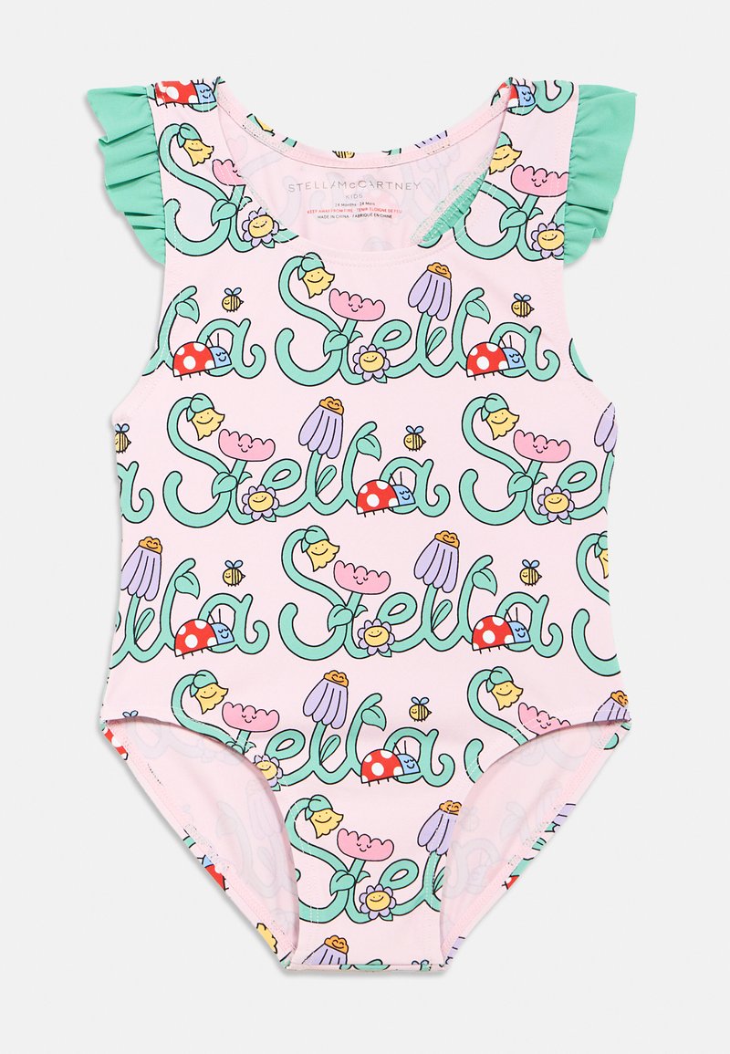 Kupaći kostim s ružičastom pozadinom s uzorkom cvijeća i crtanih likova, zelenim naborima na ramenima, dizajnom bez rukava i tijesnim pristajanjem.