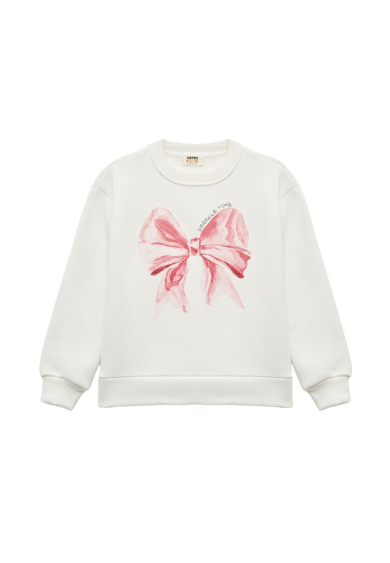 Witte sweatshirt met een grote, aquarel-stijl roze strikafbeelding met de tekst "SPARKLE TIME" boven de strik. Geribde manchetten en onderrand.
