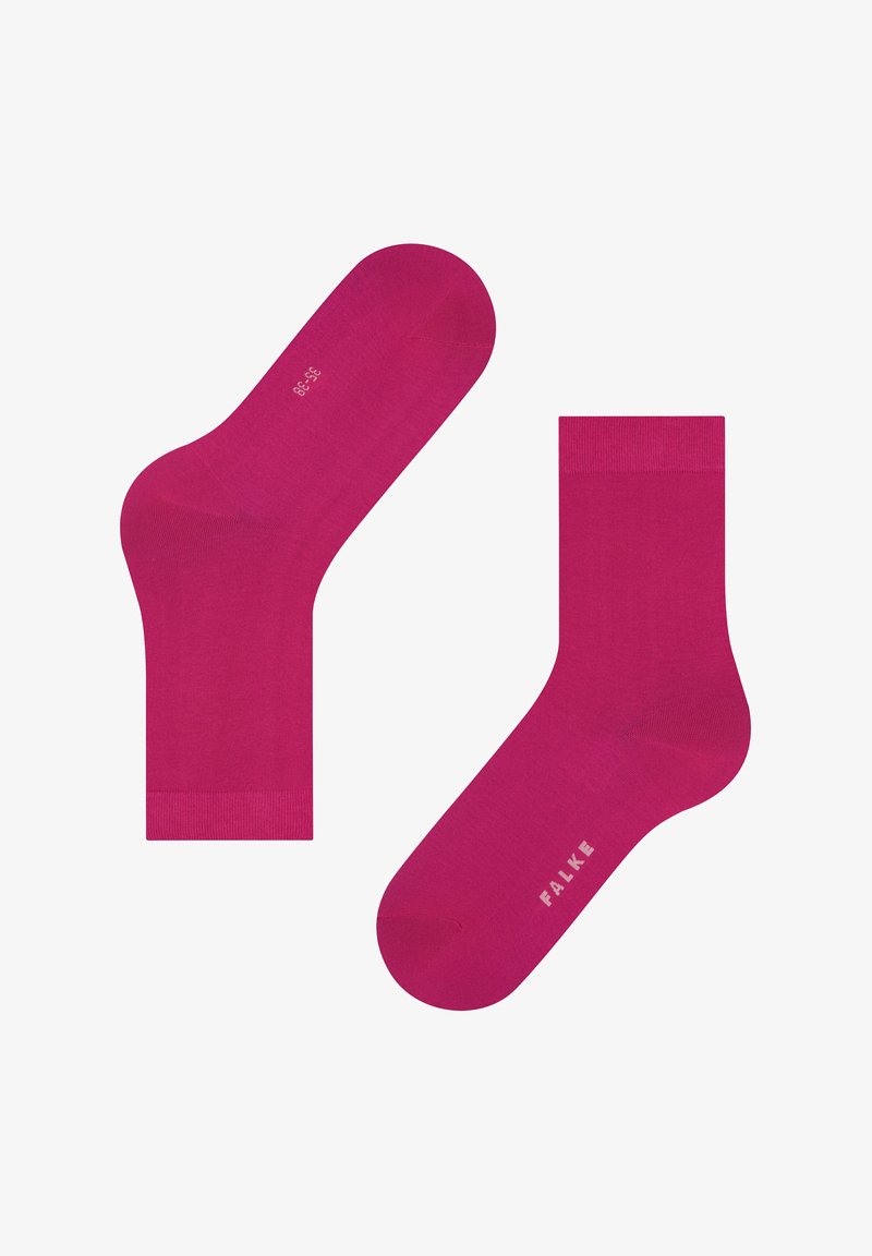 Calzini di cotone rosa brillante con una texture liscia, dotati di una fascia a coste e con la stampa "FALKE" sul lato. Design standard alla caviglia.