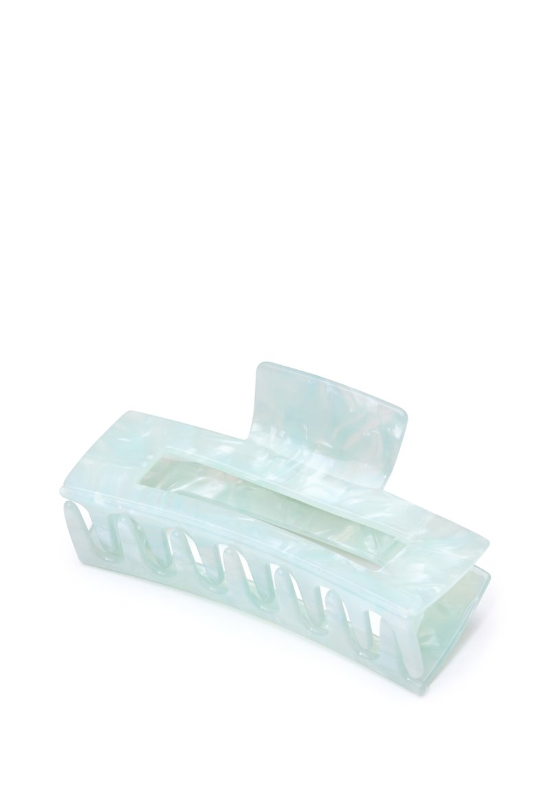 Transparent akryl hårklämma i ljus mintfärg, slät yta, avlång oval form och flera öppna spår för att säkert greppa håret.