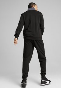 Puma POWER SET - Tuta - black