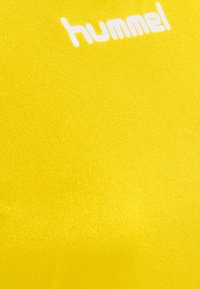Hummel Triko s potiskem - yellow