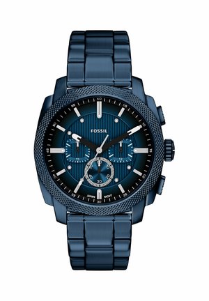 Blauwe Fossil chronograaf horloge met drie subdials, zilveren wijzers, gestructureerde lunette en metalen schakelarmband.