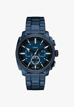 Blauwe Fossil chronograaf horloge met drie subdials, zilveren wijzers, gestructureerde lunette en metalen schakelarmband.