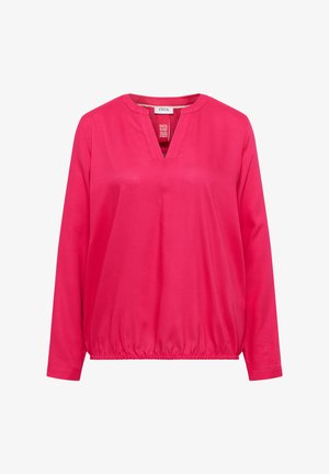 Langærmet lyserød bluse lavet af glat stof, med V-udskæring, elastisk kant og en afslappet pasform.