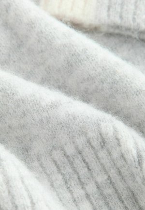Light gray knit sweater fabric featuring a soft, fuzzy texture with ribbed patterns. The material appears warm and cozy.