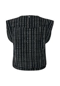 Haut à manches courtes à carreaux noir et blanc avec une coupe ample et une forme carrée, présenté sur fond blanc.