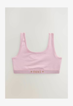 Roosa puuvillane bralette, millel on ümar kaelus, laiad õlavarre rihmad ning bränditud elastne pael, millel on kuldne trükk ja südame aktsendid.