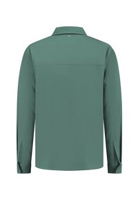 Langsleev shirt in gedempt groen, gladde stof, knopenmanchetten en een kraag. Beschikt over een achterpand voor structuur en ontwerpdetaillering.