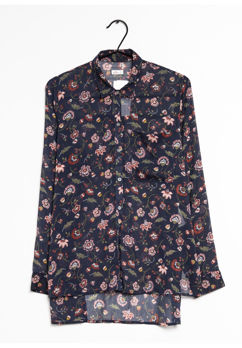 Navy floral shirt with long sleeves and a button-down collar. Features multicolored floral patterns, lightweight fabric, and curved hem.