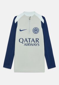 Nike langermet treningstopp i lys grå med marineblå ermer, halv glidelås, med Qatar Airways-logo og Inter Milan-emblem.
