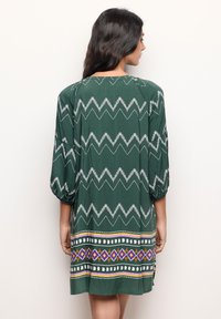 Yamamay YAMIRA - Strandaccessoire - dark green with print