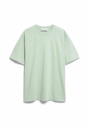 Hellgrünes Baumwoll-T-Shirt mit kurzen Ärmeln, Rundhalsausschnitt und entspannter Passform, vor weißem Hintergrund dargestellt.