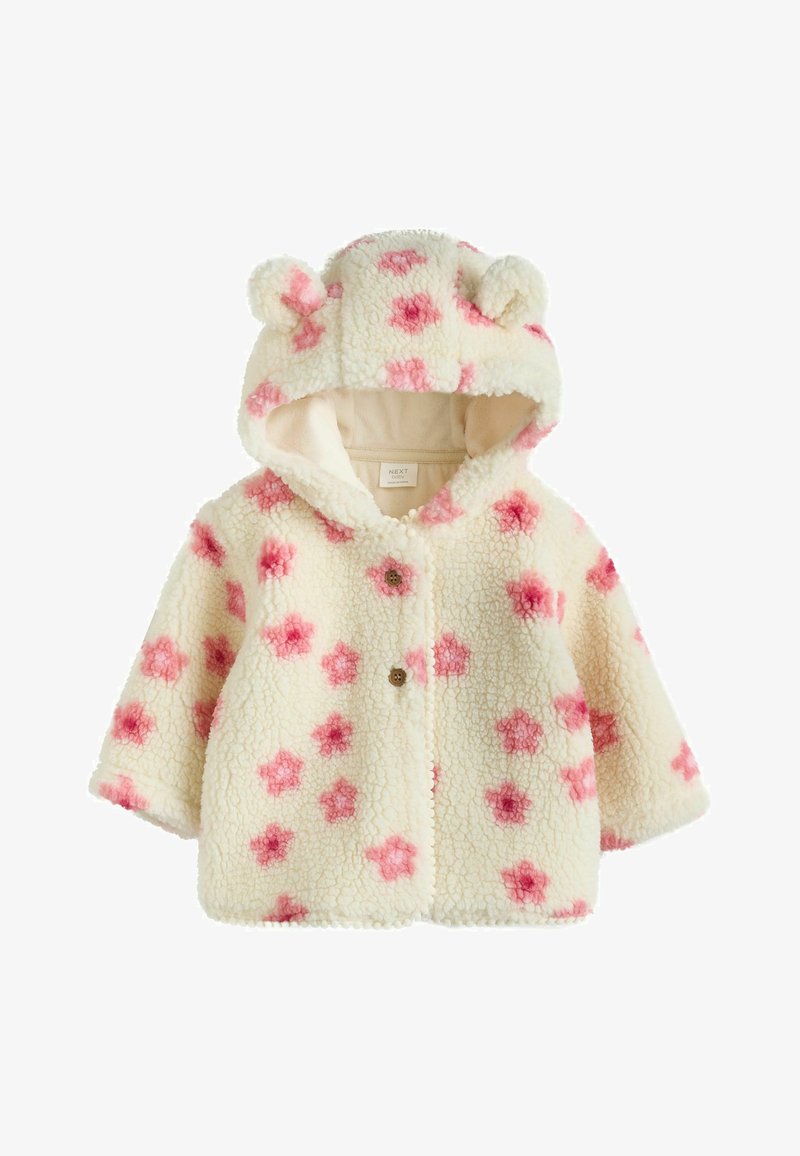 Krämfärgad fleecetröja för småbarn med rosa blomfläckar, huva med björnöron och två knappar framtill.
