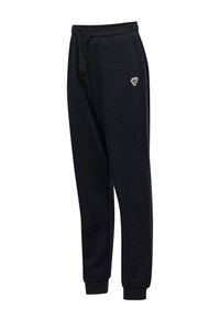 Zwarte sweatpants met een trekkoord in de taille, taps toelopende boorden en een klein logo-detail aan de voorkant. Gemaakt van zacht, gestructureerd materiaal.
