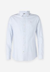 Világoskék, hosszú ujjú ing, gombos gallérral, texturált anyagból, elöl gombos záródással, és kis hímzett logóval a mellkasán.