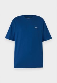 Blue cotton t-shirt with short sleeves. Features a round neckline and small white "Hollister" logo on the chest. Plain design, no patterns.
