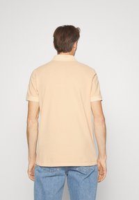 BOSS Polo - light/pastel orange