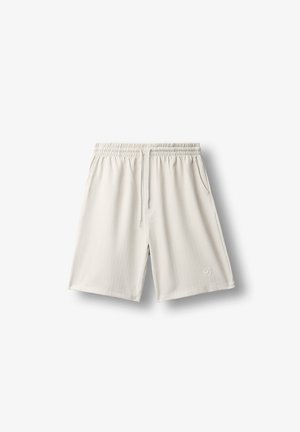 Hellbeige knielange Shorts mit elastischem Bund, Kordelzug, Seitentaschen und dezentem besticktem "B"-Logo am linken Bein.