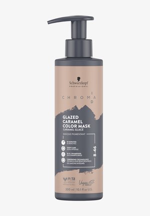Masque colorant caramel glacé Schwarzkopf Chroma ID dans un flacon cylindrique beige mat avec une pompe gris foncé, présentant les détails du produit en texte noir.