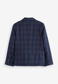 Marineblauwe geblokte blazer met een geknipt kraag, lange mouwen en twee knopen aan de mouwen. Bevat een textuurstof en een vented back ontwerp.