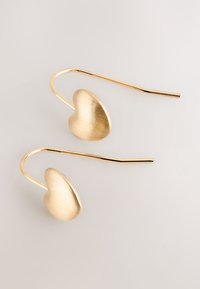 Gold-tone heart-shaped earrings with a brushed texture, featuring elongated hooks for secure wear. Simple and elegant design.