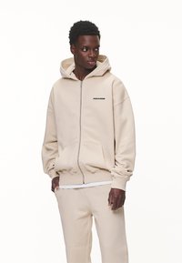 Pegador LOGO OVERSIZED JACKET - Zip-up sweatshirt - washed desert sand/black gum