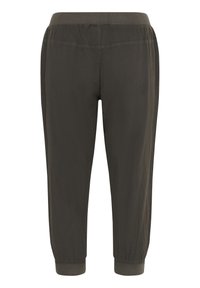 Ciemnozielone tapered joggery z elastycznym pasem i mankietami. Materiał wydaje się gładki z delikatnym połyskiem. Prosty, nieozdobiony design.