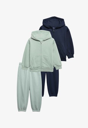 Due set di felpe con cappuccio con zip per bambini e pantaloni jogger con vita elasticizzata in verde chiaro e blu navy, mostrati su sfondo bianco.